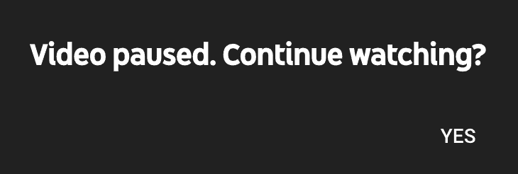 Text in white block letters on a black background. The text says: Video paused. Continue watching? YES.